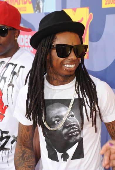 lil wayne piercings pictures. Ok please stop with the lip piercings already. Yes Little Wayne got his lip 